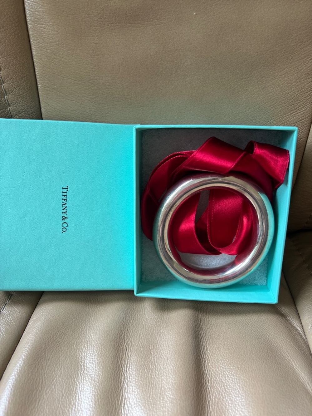 Tiffany & Co. Silver Bangle with Deep Red Satin Ribbon